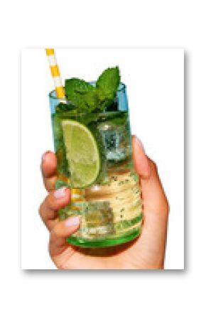 Lady's hand holding glass of cold, refreshing mojito with lime and bright straw against transparent background. Concept of party, relax, alcohol, holidays, celebrations, Friday mood.