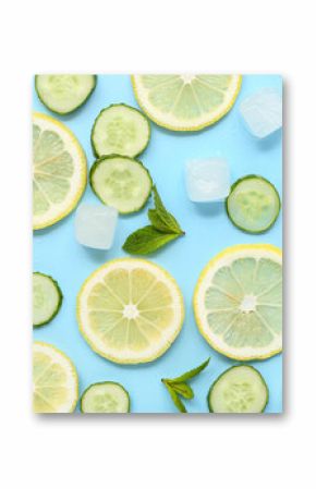 Lemon with cucumber, mint and ice cubes on blue background. Ingredients for mojito