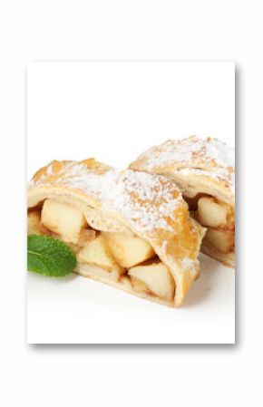 Pieces of tasty apple strudel with powdered sugar and mint isolated on white