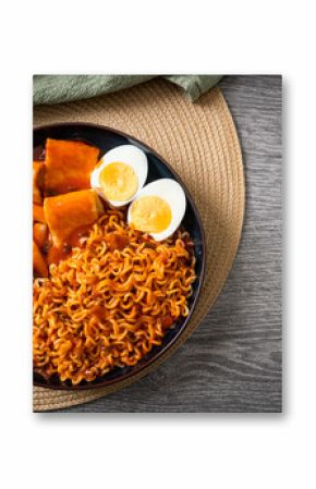Korean instant noodles with Korean rice cake and fish cake and boiled egg