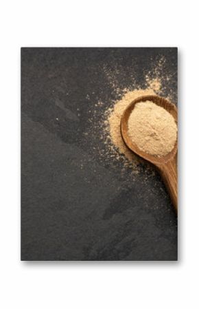 Organic Peruvian maca powder in spoon - Lepidium meyenii