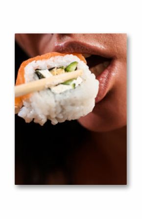 Sushi closeup in sexy woman mouth. Sexy woman eating sushi with chopsticks. Model eat sashimi. Sensual bite of sushi. Female tasting nigiri. Lunch at Japanese restaurant. Desire for delicious sushi.