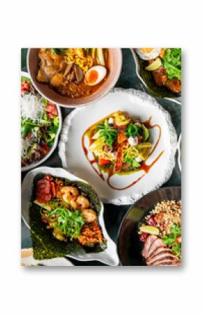 A vibrant assortment of gourmet dishes including fresh salads, ramen, seafood, and meat, beautifully plated with colorful ingredients, showcasing culinary artistry and appetizing presentation