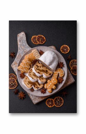 Christmas Stollen, a German sweet cake with marzipan and fruit. Winter Christmas Stollen