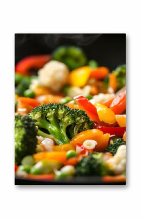 stir fried vegetables in a wok on dark table