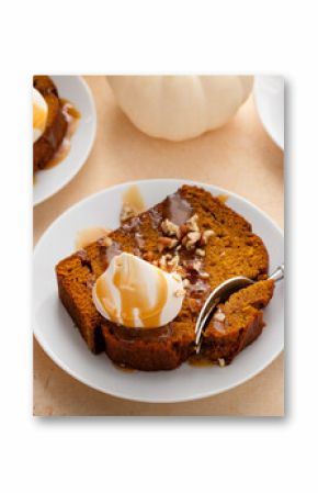 Pumpkin bread freshly baked topped with whipped cream, Thanksgiving dessert