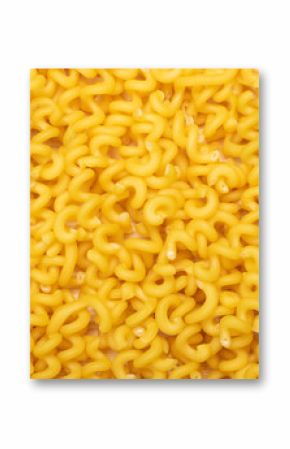 Raw yellow cavatappi pasta texture background top view. Pile of dry uncooked noodles pattern