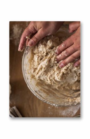 Female hands kneading dough for home baking