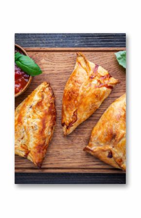 Asian food Samsa or samosas with chicken fillet on cutting board. Top view