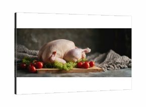 The Chicken on a Rustic Cutting Board with Tomatoes and Lettuce
