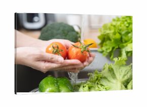 people washing raw vegetables at sink in the kitchen prepare ingredient for cooking