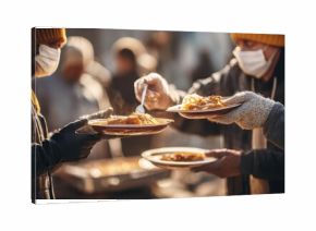 Volunteers serve warm meals to homeless individuals during community outreach event in city park on a chilly afternoon