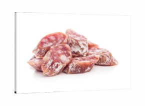 Sliced fuet sausage with mold isolated on white background.
