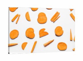 Composition with slices and pieces of fresh sweet potatoes isolated on white background