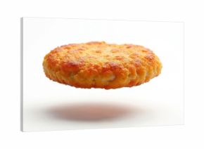 Golden brown fried breaded patty floats mid air over white surface creating shadow. Ready for burger assembly or snack. Minimalist food style.