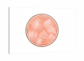 Overhead perspective of a pink soda beverage with ice cubes in a glass, isolated on a white backdrop with clipping path.