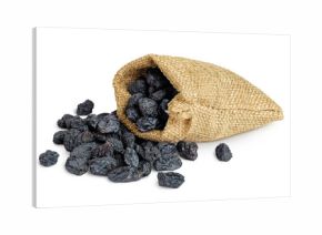 black raisins in bag isolated on white background