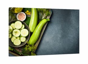 A bowl of sliced zucchini ready for cooking. Close-up. Top view.