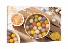 Colorful sweet glutinous rice balls tangyuan in sweet ginger syrup soup