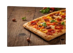 Homemade mini hamburgers with black buns, emphasizing food preparation and presentation