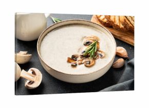 Mushroom soup puree on white kitchen table.