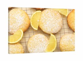 Tasty lemon cookies with fruit slices on white table, top view