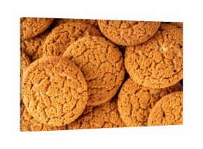 Homemade golden-brown Gingersnap Cookies stack on kitchen table. Traditional american ginger snap cracked biscuit cookies, with milk glass, copy space