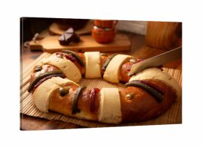 Rosca de Reyes, also called Three Kings Bread, Roscon, Epiphany Cake, traditionally served with hot chocolate in a clay Jarrito. Mexican tradition on January 5th.