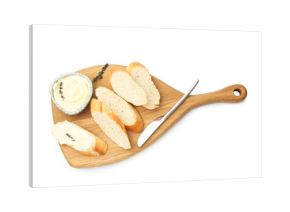 Slices of baguette with butter, thyme and knife isolated on white, top view