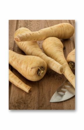 Parsnips roots and chefs knife