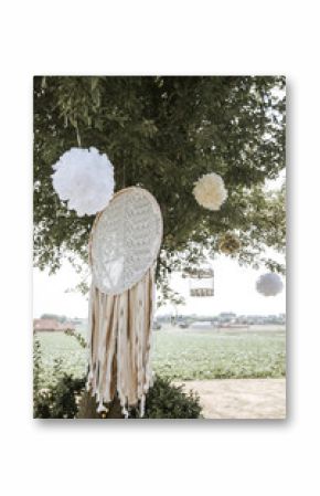 wedding decorations hanging in tree