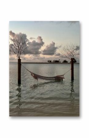 Boho Hammock Hanging Over Shallow Tropical Water