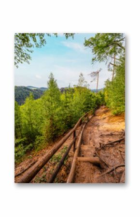 Hiking to Maria or Mariina skala wooden viewpoint built on a rock. It offers a beautiful view of the town of Jetrichovice in Bohemian Switzerland