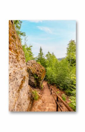 Hiking to Maria or Mariina skala wooden viewpoint built on a rock. It offers a beautiful view of the town of Jetrichovice in Bohemian Switzerland