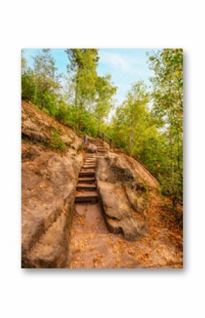 Hiking to Maria or Mariina skala wooden viewpoint built on a rock. It offers a beautiful view of the town of Jetrichovice in Bohemian Switzerland