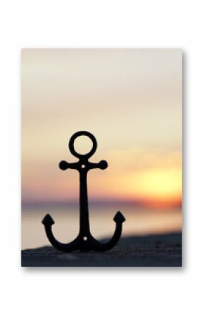 Anchored in Serenity: iron anchor Symbol by the Sunset Sea