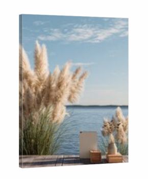 Coastal scene with pampas grass and tablet