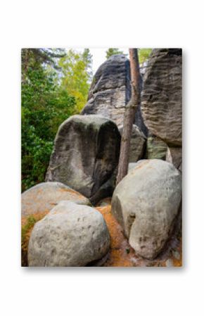 Exploring the stunning rock formations of Besedice Rocks during autumn reveals vibrant foliage and unique geological structures surrounded by serene forest trails.