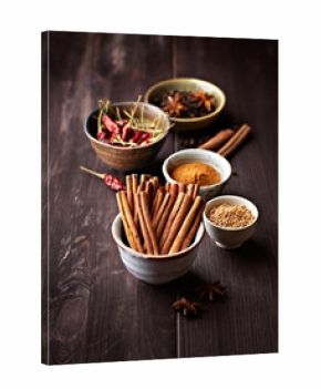 Assorted spices in small containers