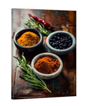 Assorted spices in small containers