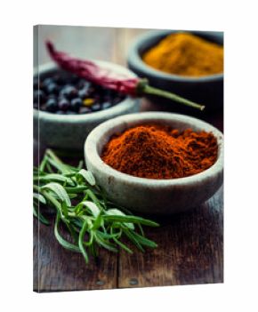 Assorted spices in small containers
