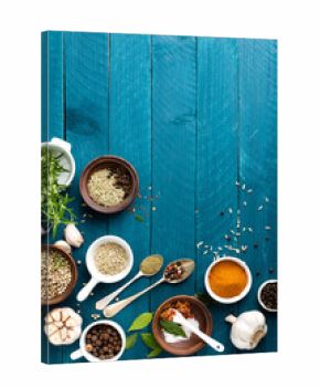 culinary background and recipe book with various spices on wooden table
