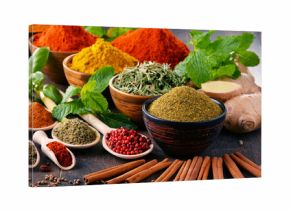 Variety of spices and herbs on kitchen table
