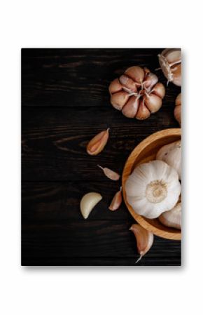 garlic ingredient on wood background top view