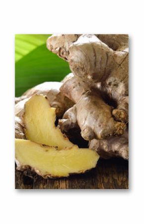 Fresh ginger root on wooden background