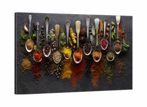 Herbs and spices on graphite background