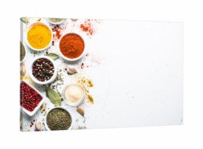 Spices in a bowls on white.