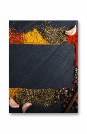 Different kind of spices on a black background