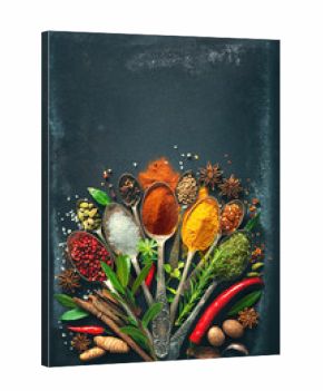 Various herbs and spices on dark background