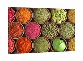 Colorful Indian spices background, top view.  large set of seasoning is lined with a rainbow